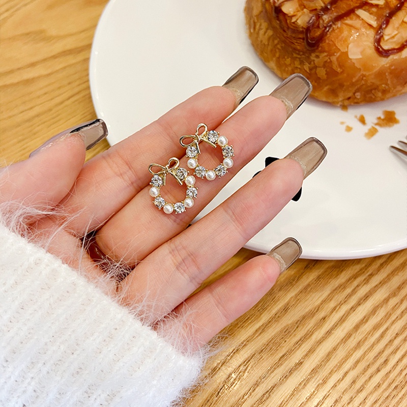 Bông tai trang trí nơ đính hạt ngọc trai phong cách Hàn Quốc dành cho nữ