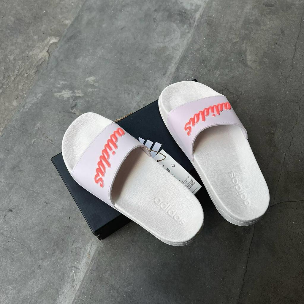 Dép chính hãng Adidas Adilette Shower nữ màu hồng nhạt logo cam