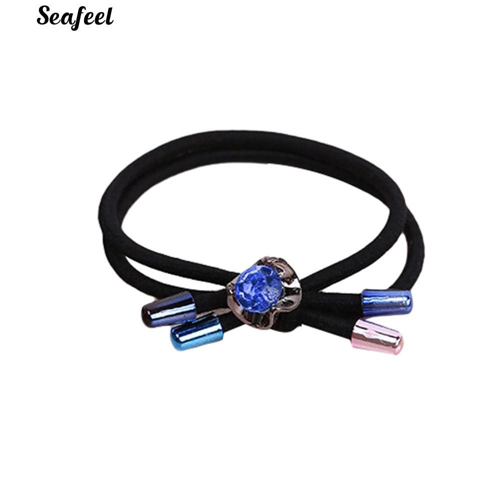 Thun cột tóc đính đá.