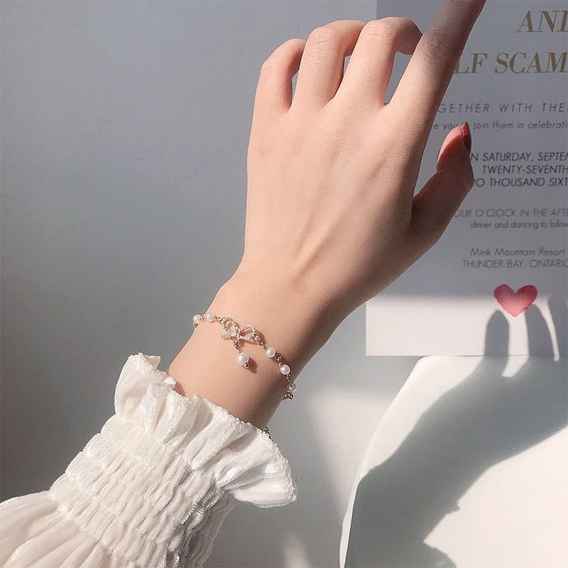 Vòng tay nơ mạ vàng đính ngọc sang chảnh
