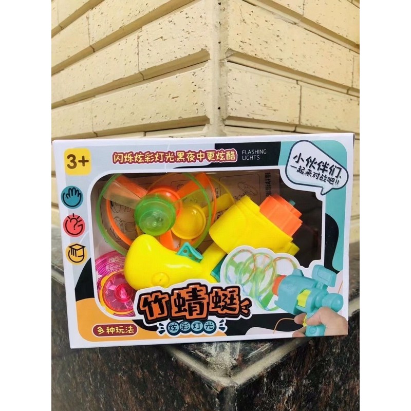 Súng con quay vặn cót mẫu mới cho bé