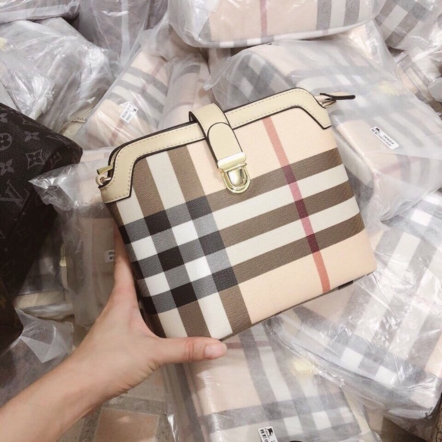 Túi xách kéo khoá giữa Buberry hàng xuất dư