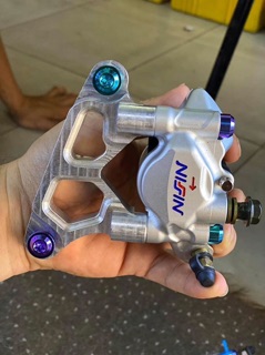 Pass heo dầu Nissin moto3