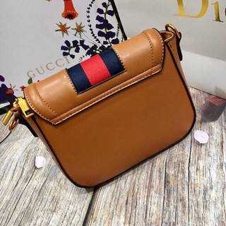 Gucci khóa bướm