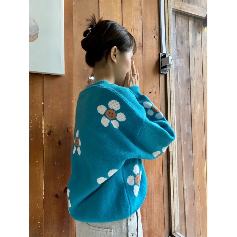 Áo len hoa màu xanh