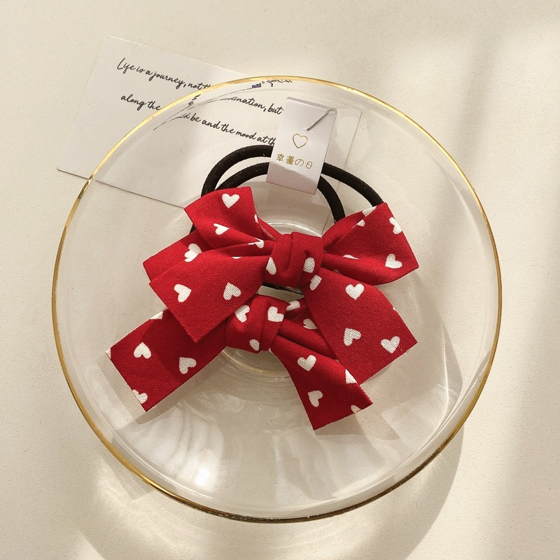 Thun cột tóc gắn nơ dễ thương phong cách Hàn Quốc