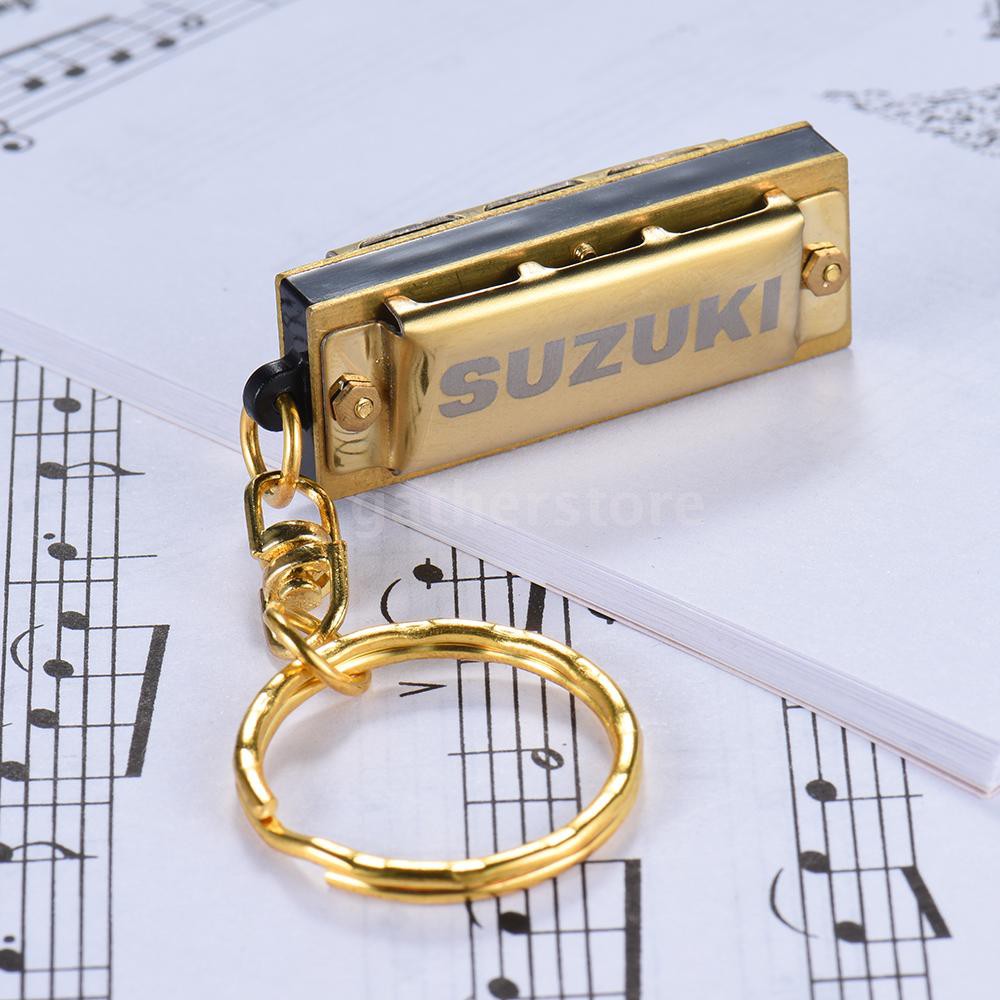 Kèn Harmonica mini 10 tông 5 lỗ phím C có gắn móc khóa logo Suzuki màu vàng kim