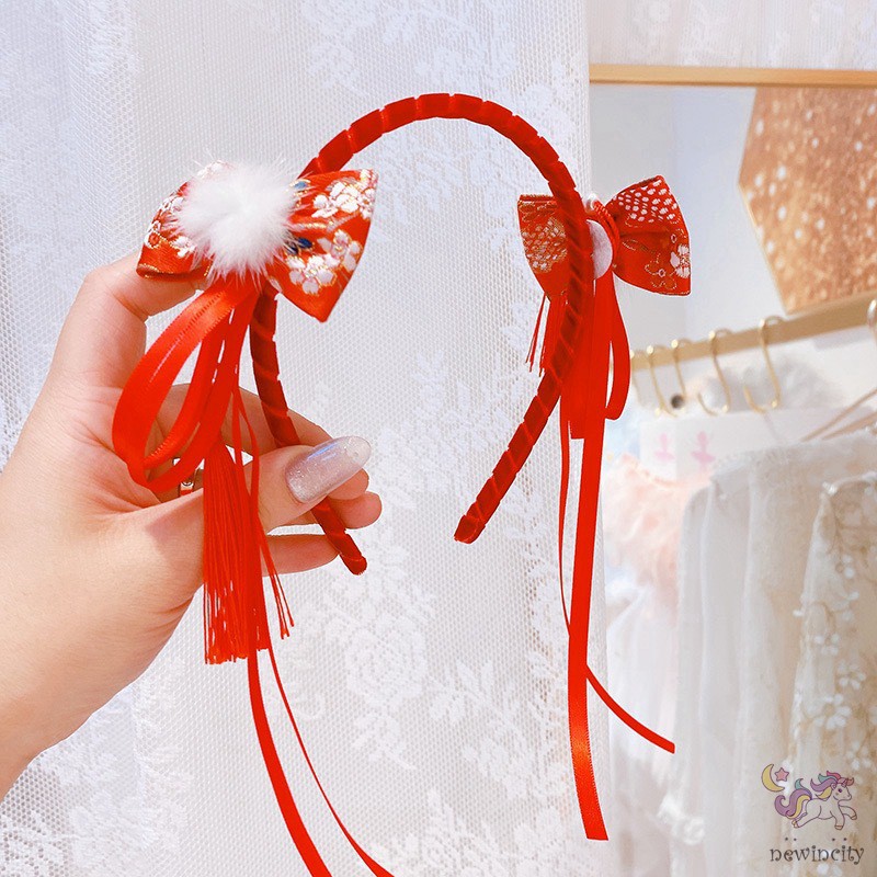 Băng đô cài tóc đính quả bóng lông phong cách retro xinh xắn cho bé gái