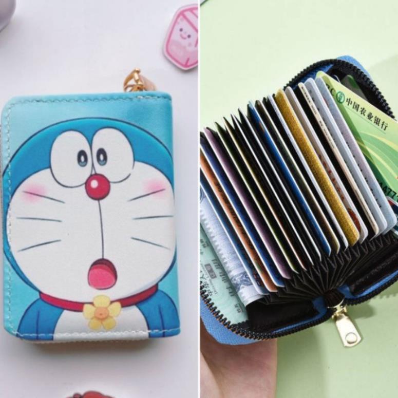 Ví Nữ cầm tay mini có khóa kéo, nhiều ngăn in hình Doraemon dễ thương dùng đựng tiền, thẻ ATM,... ❕