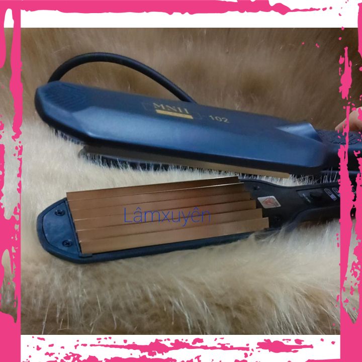 Máy bấm tóc MNH-102 bấm tóc xù đẹp,mềm bóng đẹp với chất liệu thép titan giúp Máy bấm êm, nhanh, không rít tóc