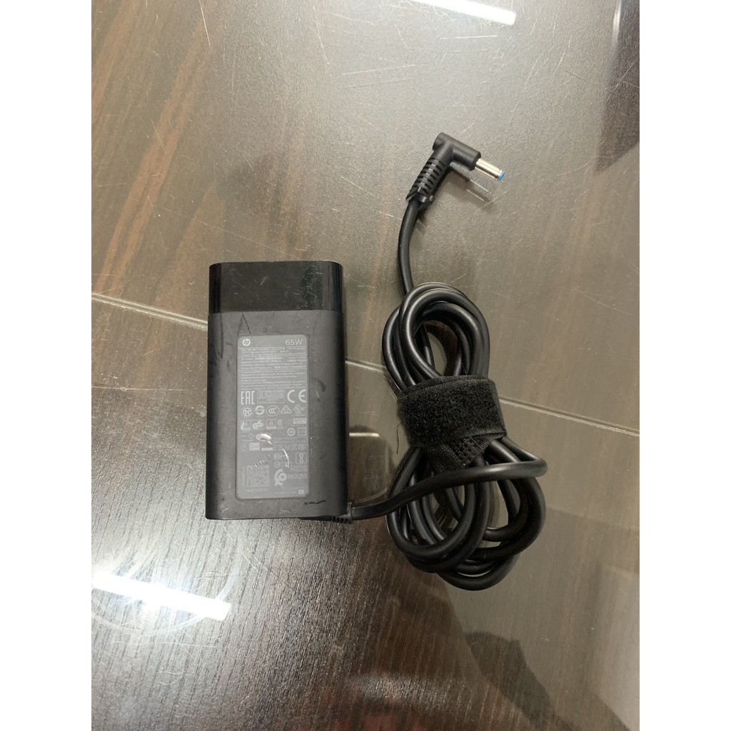 Sạc laptop HP envy 65w cũ zin theo máy