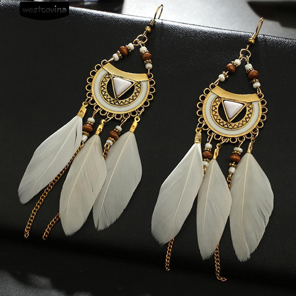 Đôi Khuyên Tai Kiểu Móc Lông Vũ Và Hạt Tua Rua Phong Cách Dân Tộc Cho Phụ Nữ