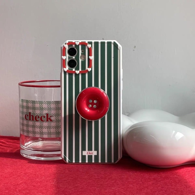 Ốp lưng noen mix cây thông, kẹo gậy và chiếc nút của Tiệm tạp hoá gần nha