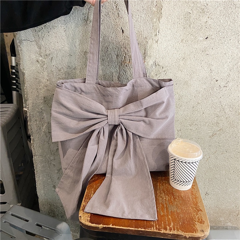 Túi xách IELGY vải canvas đính nơ thời trang cho nữ