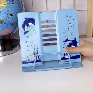 Kẹp sách sắt giúp bé ngồi học đúng cách