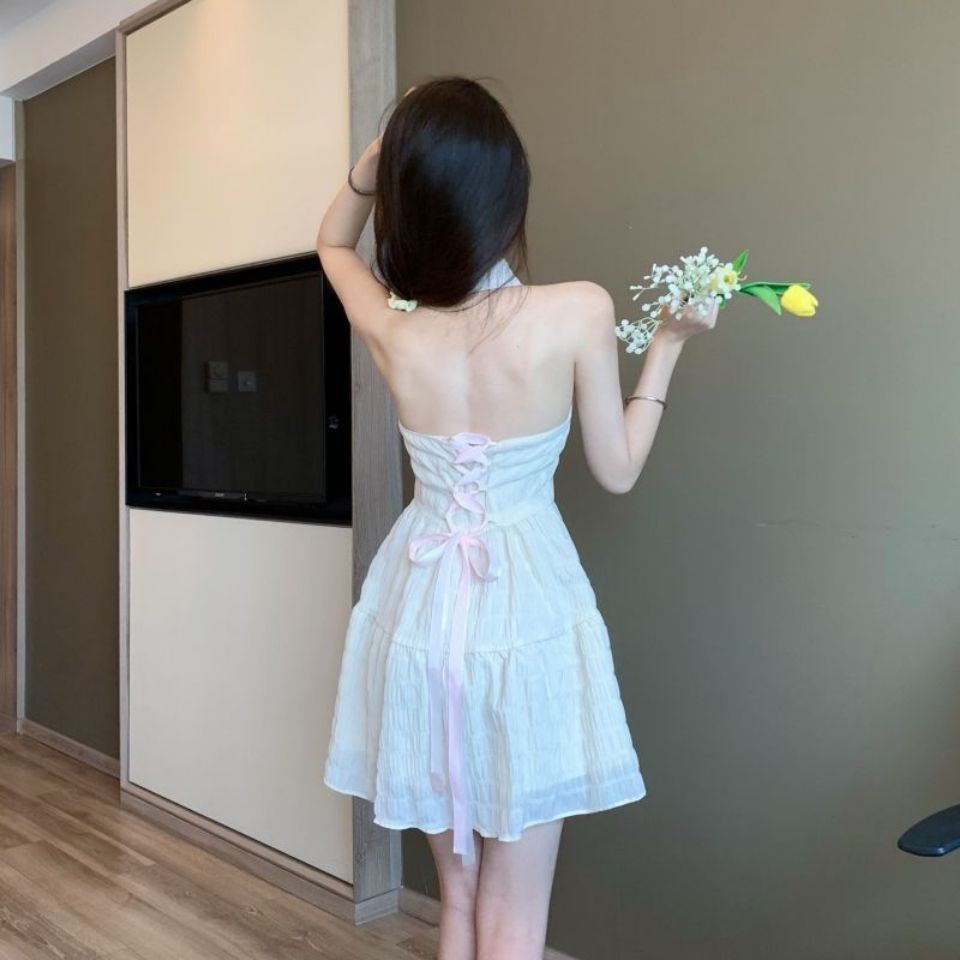 Bộ jumpsuit hai dây kiểu Pháp Hồng Kông sợi lưới tinh khiết mới hở lưng váy ngọt ngào và hot girl