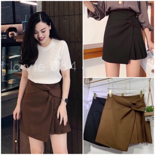 Chân váy xếp ly buộc nơ dúm eo tà lệch VNXK