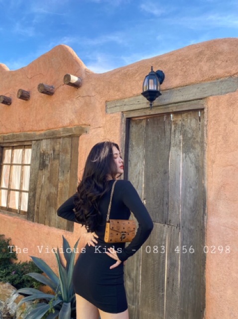 Đầm body nút bấm tay dài