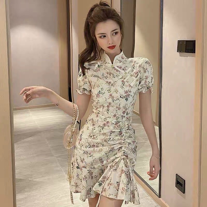 Đầm cổ tàu rút dây hông hoạ tiết hoa nhí mặc tết