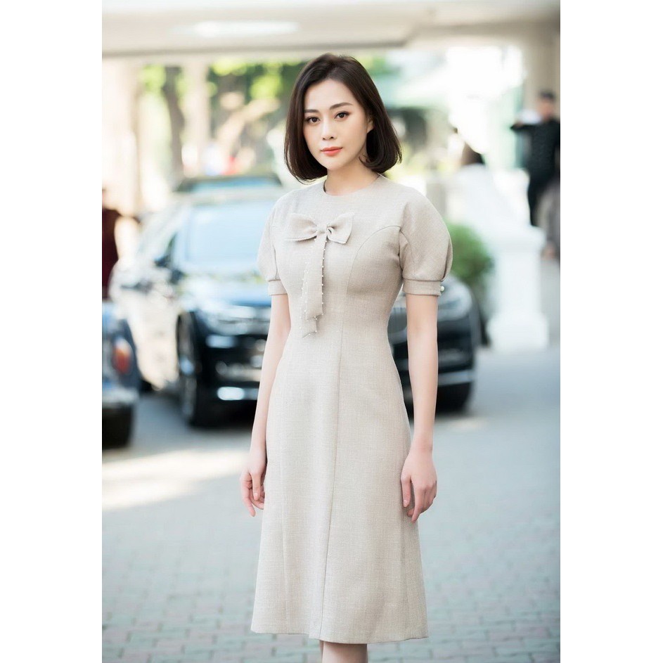 Đầm xoè tay phồng nơ ngực đi chơi | đi tiệc trắng kem cao cấp