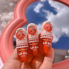 Son tint bóng môi Magic Lip Oil Trái Đào