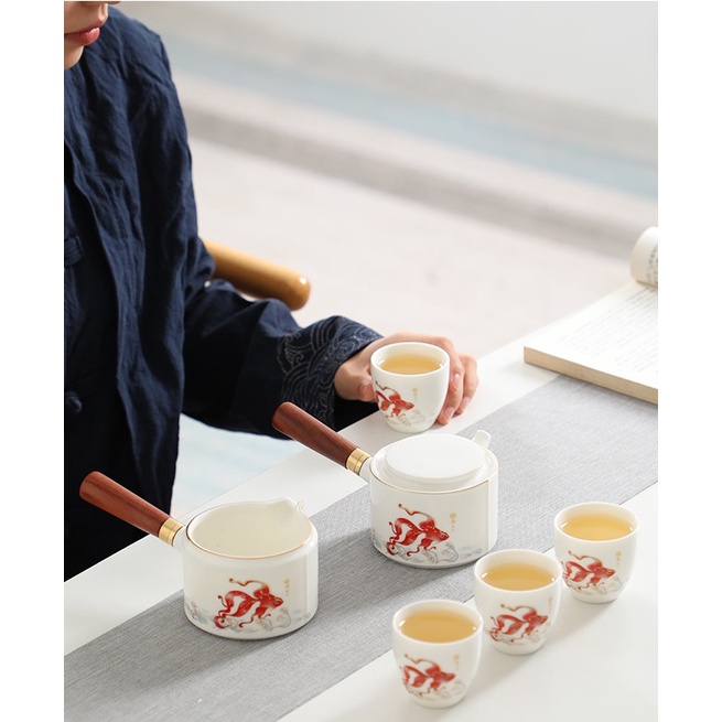 Bộ ấm chén pha trà đạo bằng sứ Trắng Bạch Định Thấu Quang
