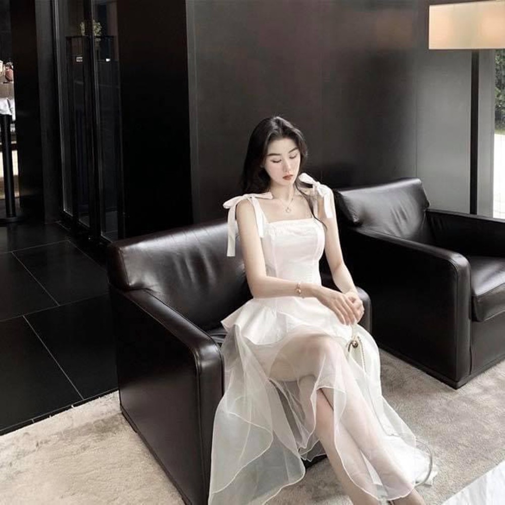 Đầm váy nữ màu trắng dáng xòe cột nơ vai lệch tà phong cách thời trang Hà Kiều thiết kế đẹp | BigBuy360 - bigbuy360.vn