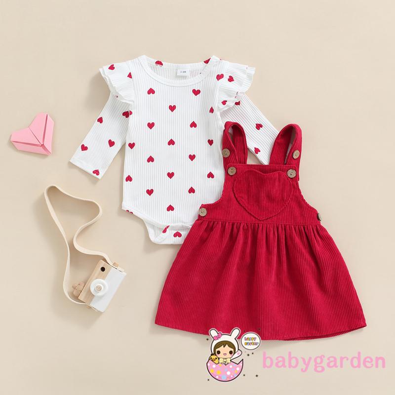 Bộ áo liền quần cổ tròn tay dài phối bèo in họa tiết trái tim kèm đầm yếm thời trang dành cho bé gái