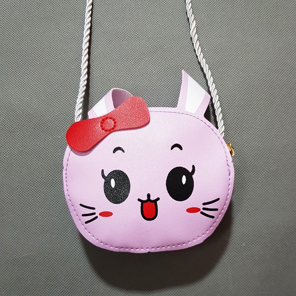 Túi đeo chéo mèo nơ va thỏ ăn cà rốt xinh xắn cho bé gái nhỏ diện đầm