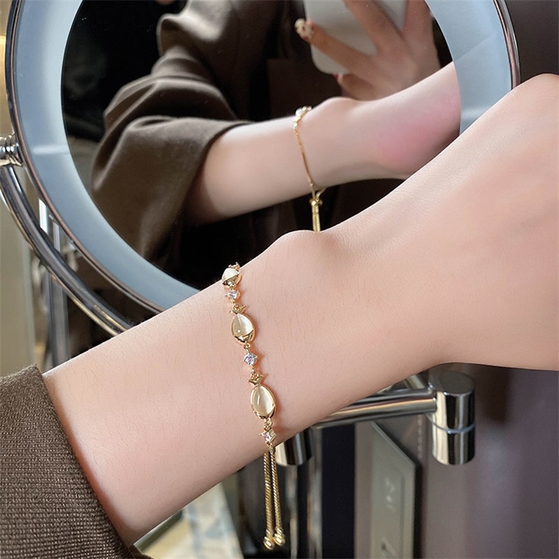Vòng tay mặt hình cá nhỏ đính đá Opal có thể điều chỉnh cho nữ