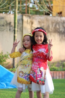 Set áo dài gấm cách tân cho bé gái