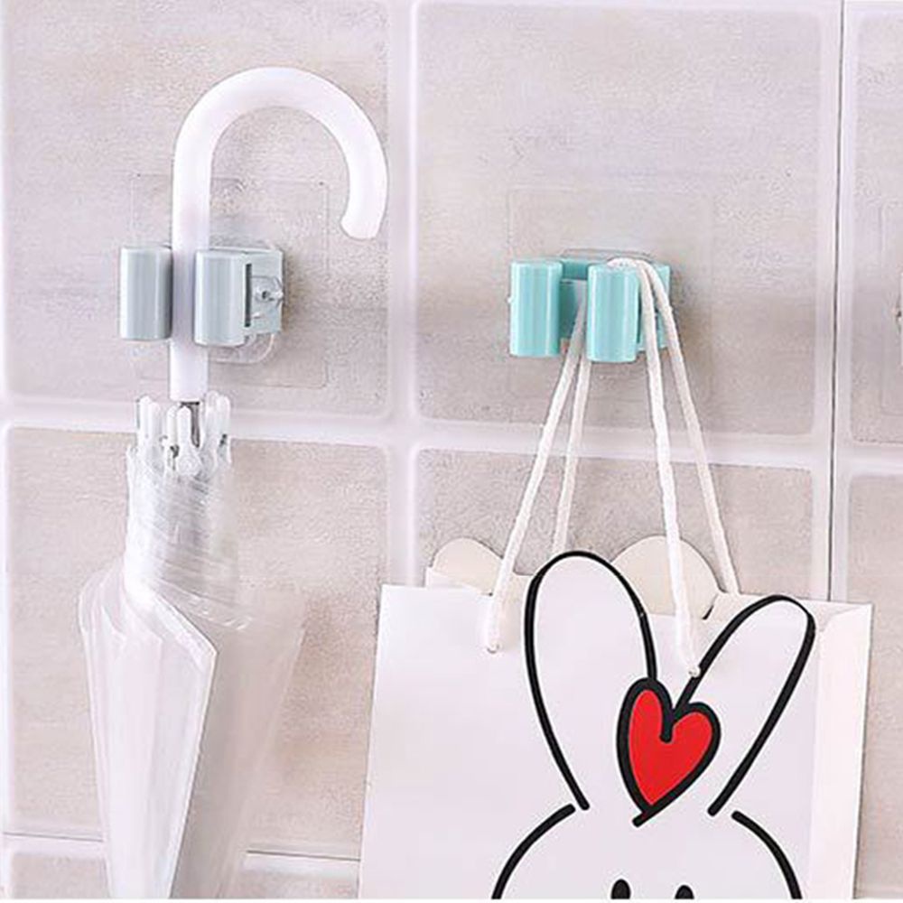 Giá treo cây lau nhà gắn tường tự dính tiện dụng