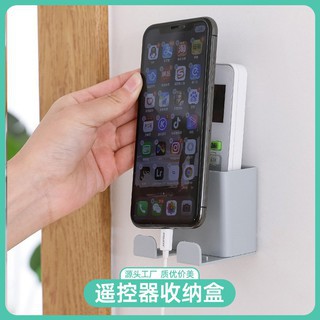 Giá kệ đựng remote điều khiển , hộp để điện thoại khi sạc dán tường đa năng dđ