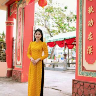 Áo dài chấm bi vàng