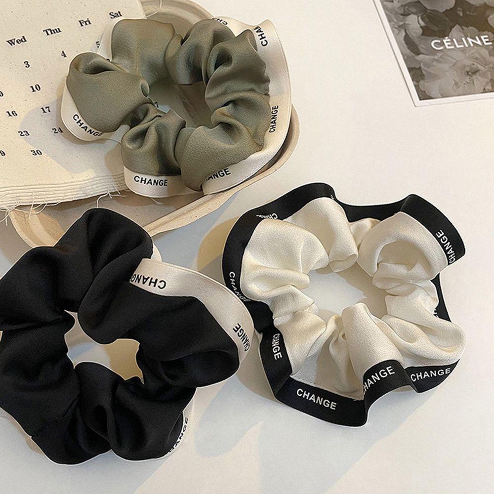 Dây Buộc Tóc Cao Su Màu Trơn In Chữ Thời Trang Thanh Lịch