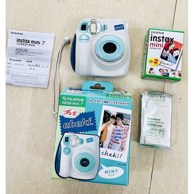 Máy chụp ảnh lấy liền Fujifilm Instax Mini 7 Cheki tặng kèm pin tiểu AA và 1 hộp film 10 tấm date 2024