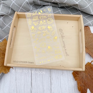 Sticker phi hành gia gold lấp lánh