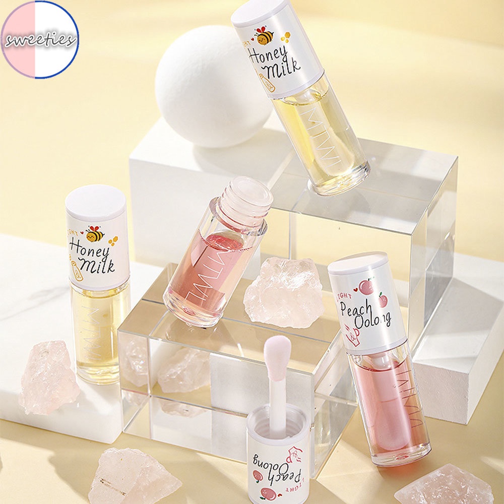 Tinh Dầu Mật Ong Ogalaini Dưỡng Ẩm Tẩy Tế Bào Chết Cho Môi