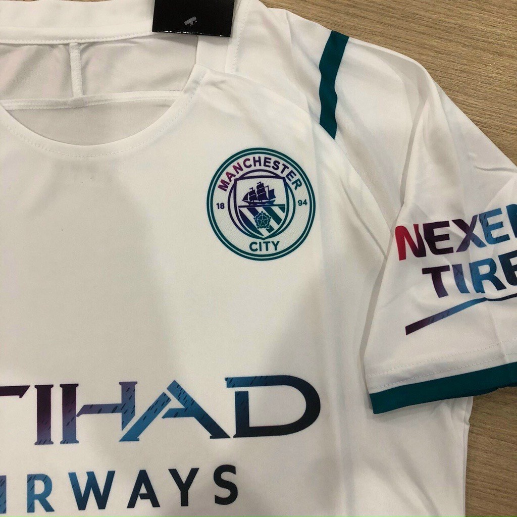 Bộ quần áo M.anchester city trắng , đen thun thái cao cấp