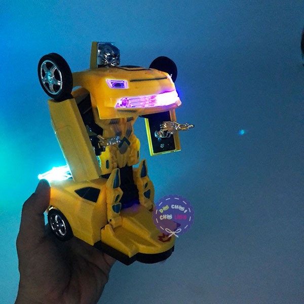 Hộp đồ chơi xe hơi ô tô biến hình Robot Transform có đèn nhạc 8986