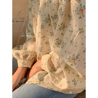Áo sơ mi hoa xanh cổ tròn