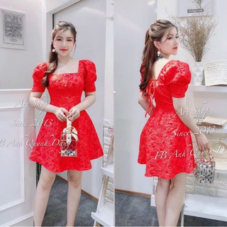 Đầm gấm xốp hở lưng cột dây nơ