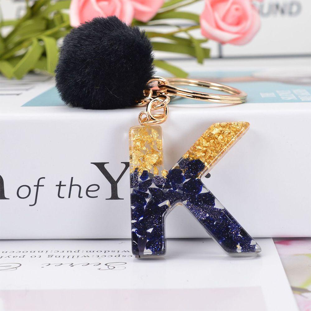 Móc Khóa Cục Bông In Chữ SUYO