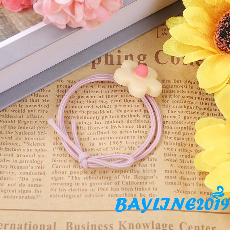 Dây buộc tóc cao su đính hoa dễ thương cho nữ