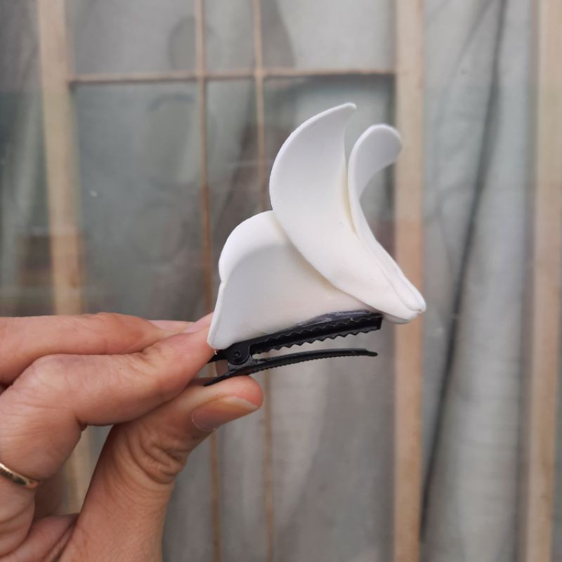 Kẹp tóc hoa sứ đi biển