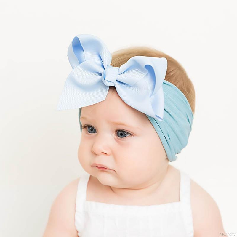 Băng đô nơ co dãn cho bé gái