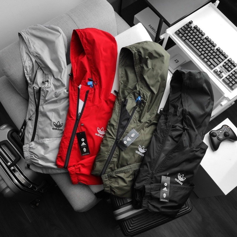 Áo khoác gió có mũ ad 2 lớp lót lưới thoáng khí