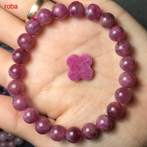 Vòng tay tour hồng 8li mix cùng cỏ 4 lá ruby