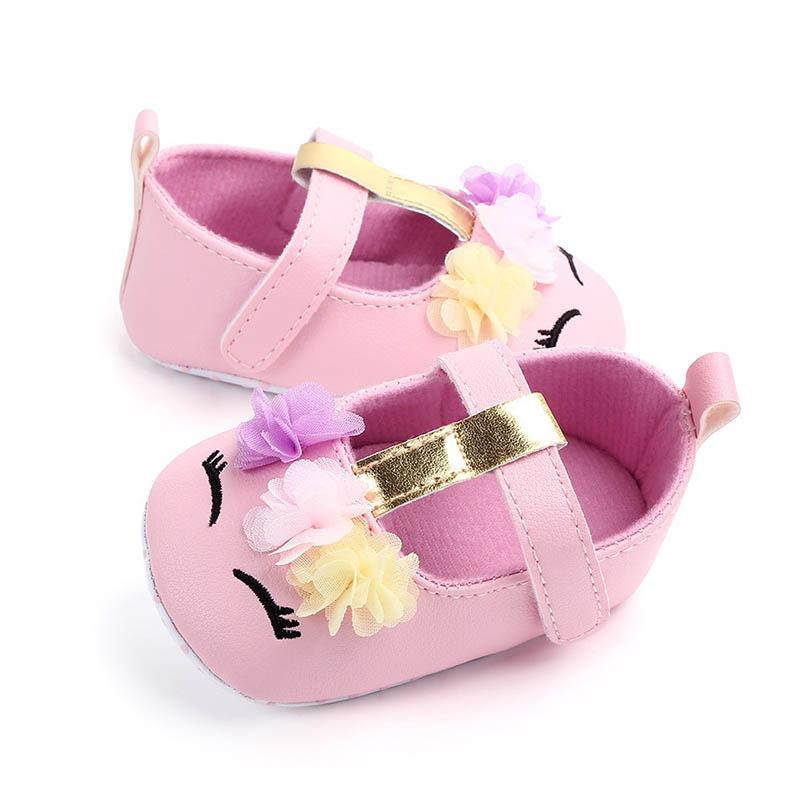 Giày búp bê gắn hoa đế mềm chống trượt cho bé gái từ 0-18 tháng tuổi