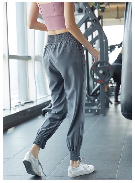 QUẦN JOGGER TẬP GYM NỮ VẢI DÙ KHOÁ CHÂN